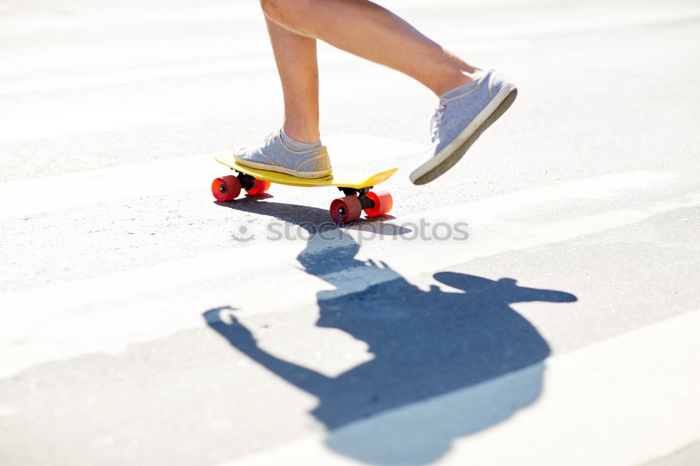 Similar – Man posing with skateboard in evening