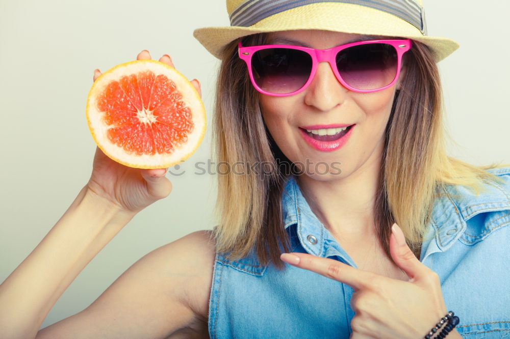 Similar – happy boy drinking orange juice on blue background