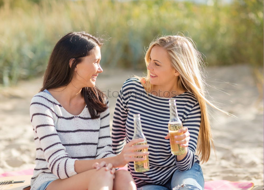 Image, Stock Photo Beautiful women drinking wine in the park.