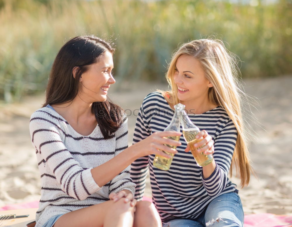 Similar – Image, Stock Photo Beautiful women drinking wine in the park.