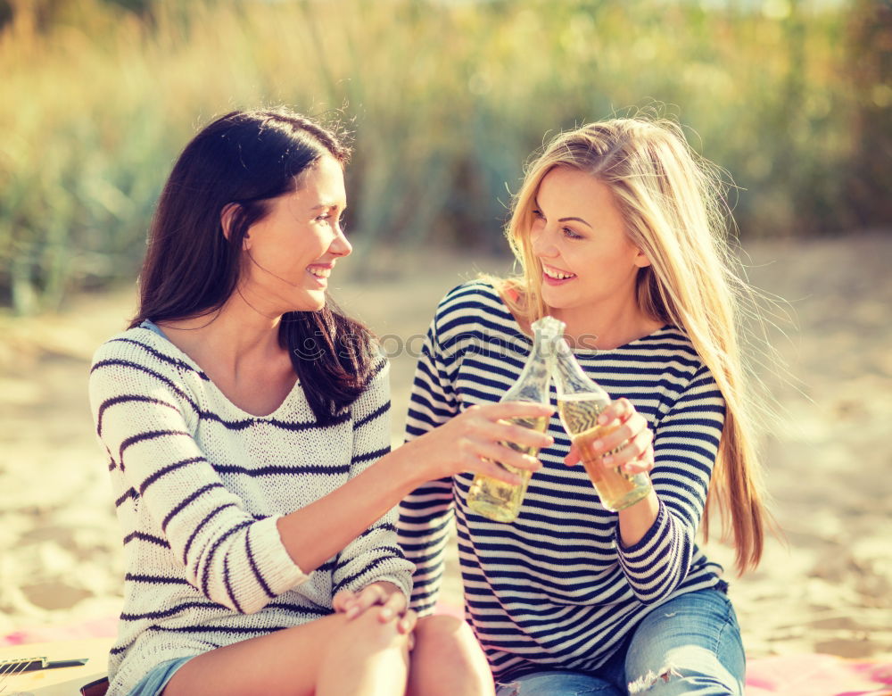 Similar – Image, Stock Photo Beautiful women drinking wine in the park.