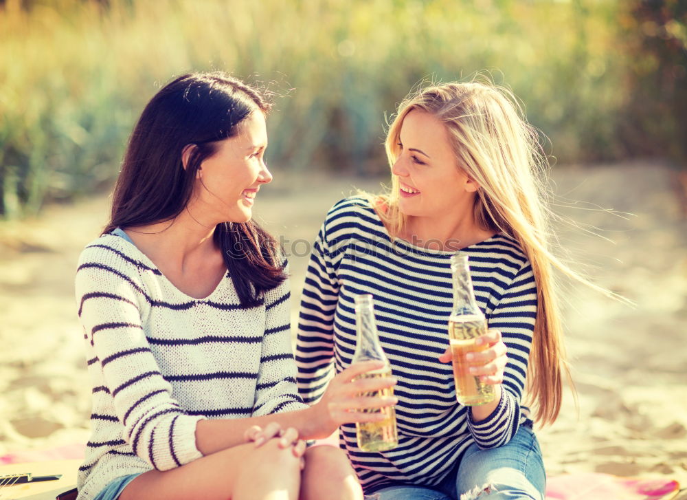 Similar – Image, Stock Photo Beautiful women drinking wine in the park.