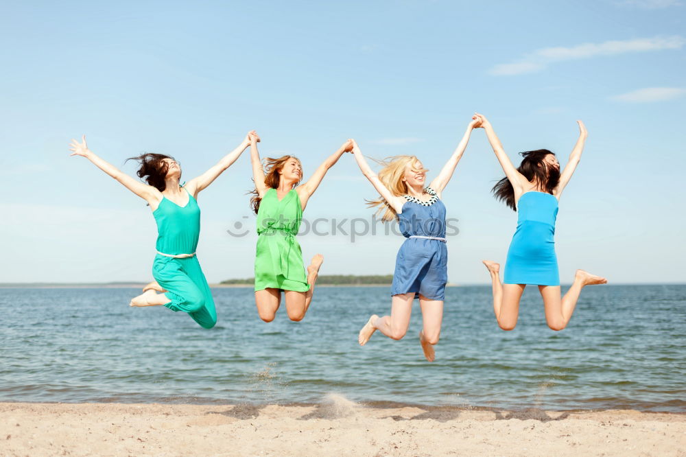 Similar – two sisters playing on the beach