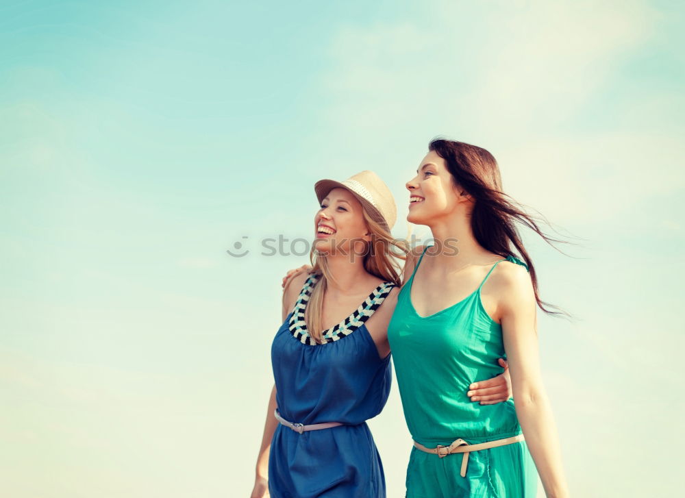 Similar – Beautiful women seating in the street.