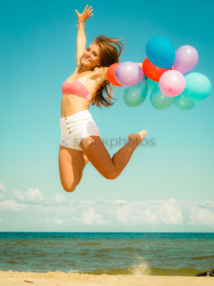 Similar – Image, Stock Photo Little girl with balloons standing on the beach