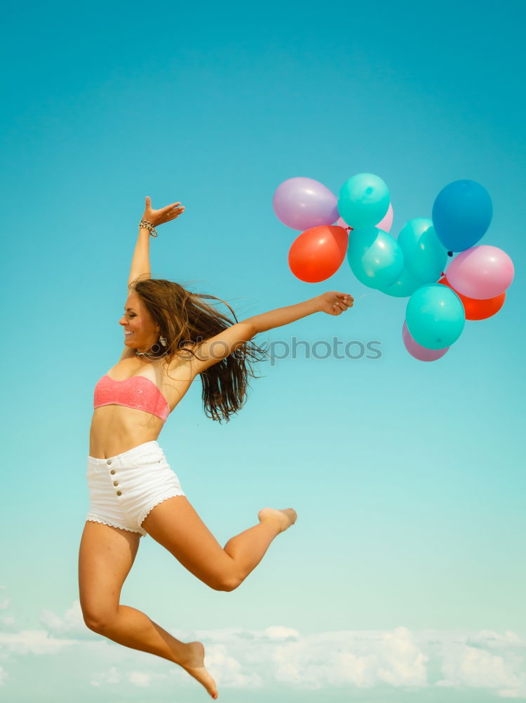 Similar – Image, Stock Photo Young mixed woman with afro hair jumping outdoors.