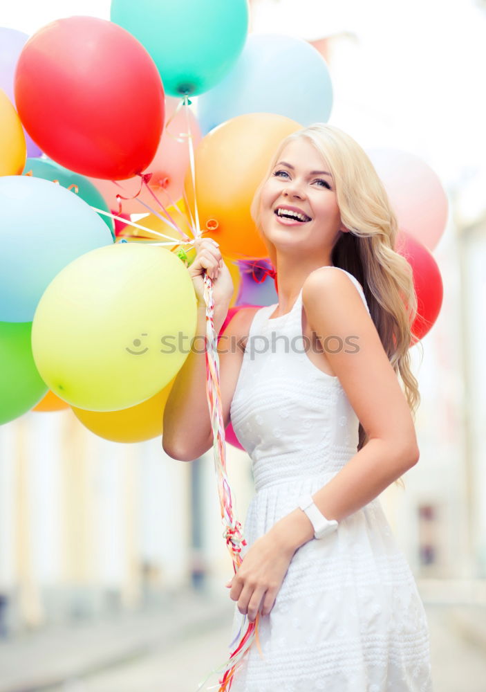 Similar – Image, Stock Photo Young woman holding colorful lollipops