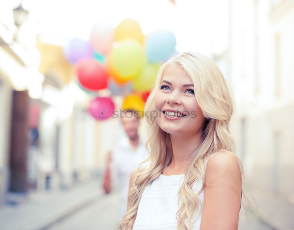 Similar – Young woman smiling in urban background.