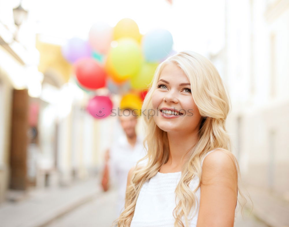 Similar – Smiling young woman in urban background.