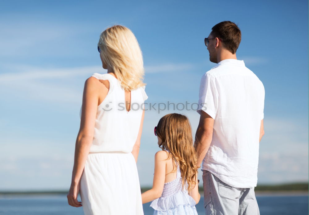 Similar – Mother and children playing on the beach at the day time. Concept of friendly family.