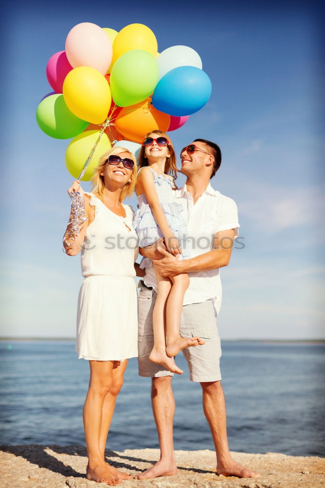 Similar – Image, Stock Photo Father and son relaxing near the house at the day time. They sitting near are the colorful wall. Concept of friendly family.