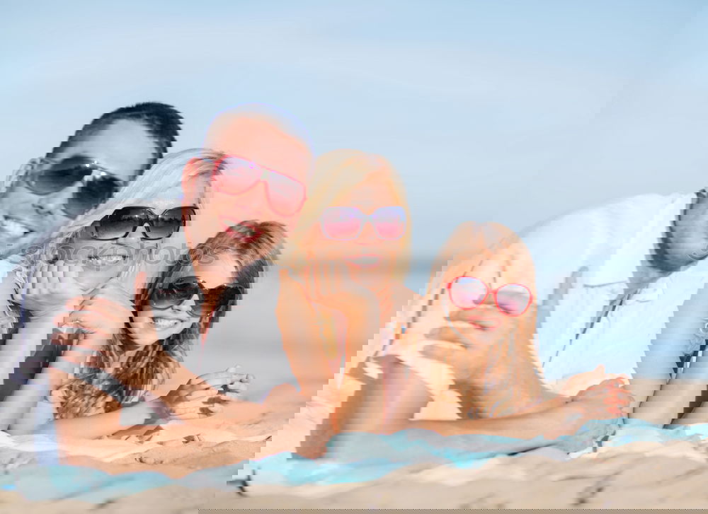 Similar – Image, Stock Photo Father and children sitting on the beach at the day time. Concept of happy friendly family.