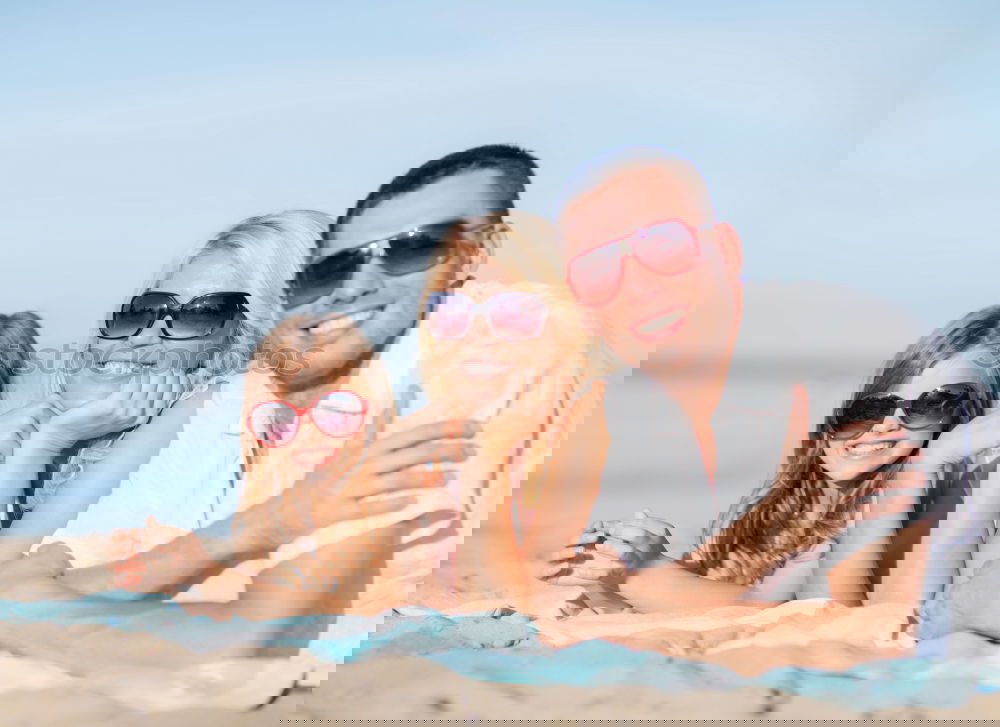 Similar – Image, Stock Photo Father and children sitting on the beach at the day time. Concept of happy friendly family.