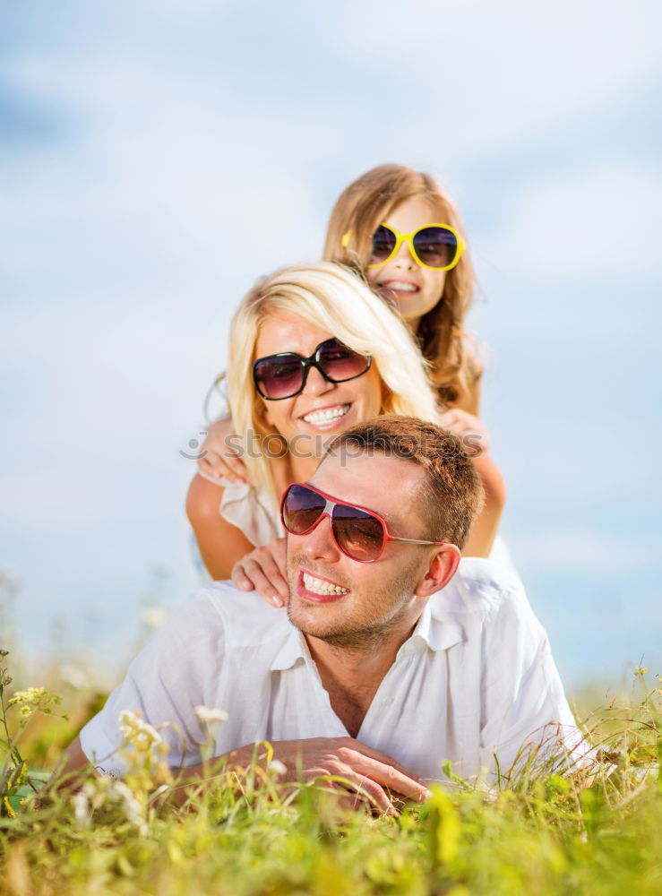 Similar – Father and children playing on the beach at the day time. Concept of friendly family.