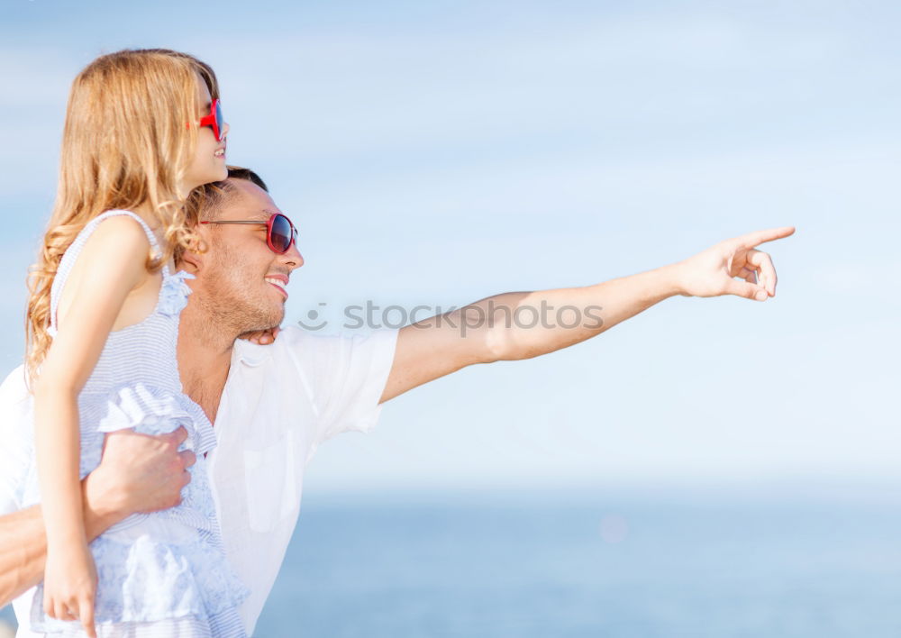 Similar – Image, Stock Photo Father and son playing on the beach at the day time. People having fun outdoors. Concept of summer vacation and friendly family.