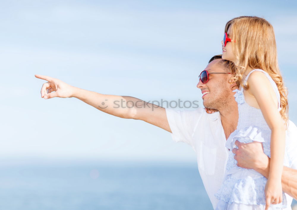 Similar – Image, Stock Photo Father and son playing on the beach at the day time. People having fun outdoors. Concept of summer vacation and friendly family.