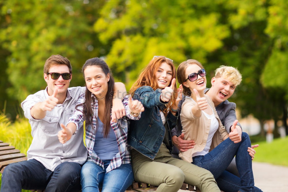 Similar – Group of young people together outdoors in urban park