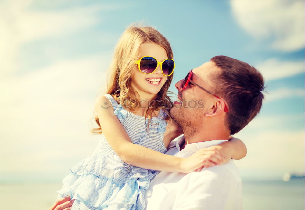 Image, Stock Photo Father and son playing on the beach at the day time.