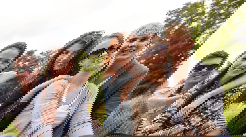 Similar – Image, Stock Photo Group of friends taking selfie in urban background.