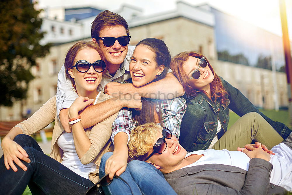 Similar – Multicultural group of young adult friends talking to each other