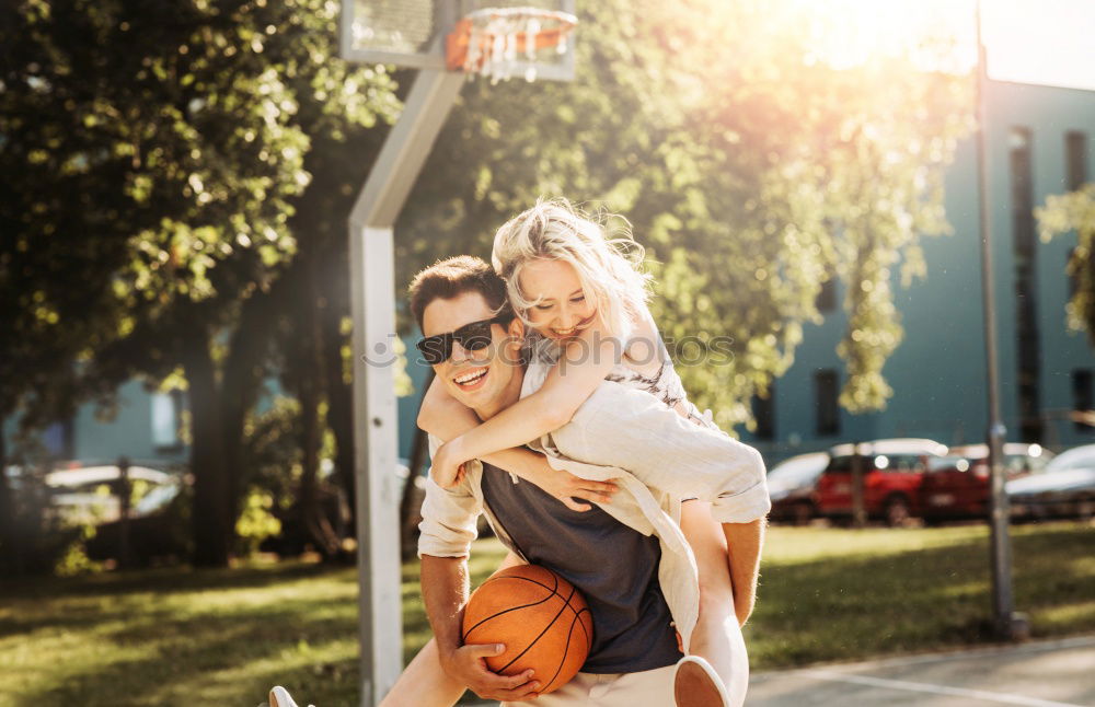 Similar – Image, Stock Photo Happy couple hugging and kissing near tree in park