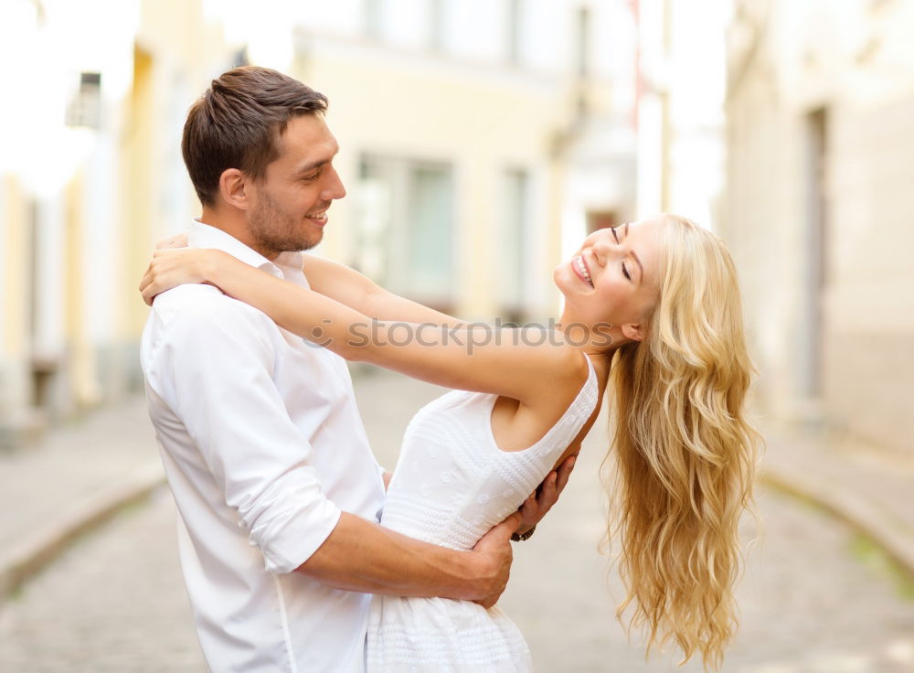 Similar – Cheerful couple having fun