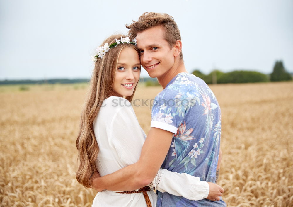 Similar – Image, Stock Photo Two loving sisters comforting each other hugging each other in a close embrace as they stand outdoors in the countryside