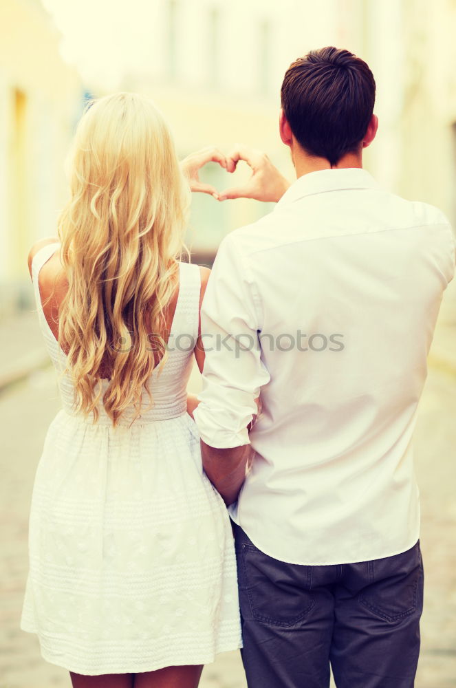 Similar – Romantic Young Couple Walking in the City.