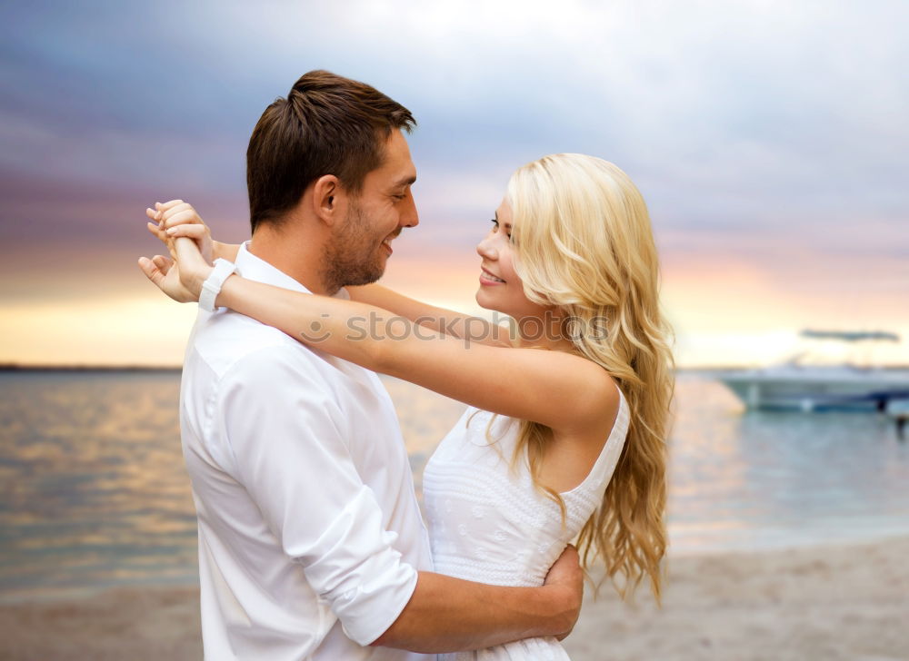 Similar – Image, Stock Photo Embracing loving couple on beach