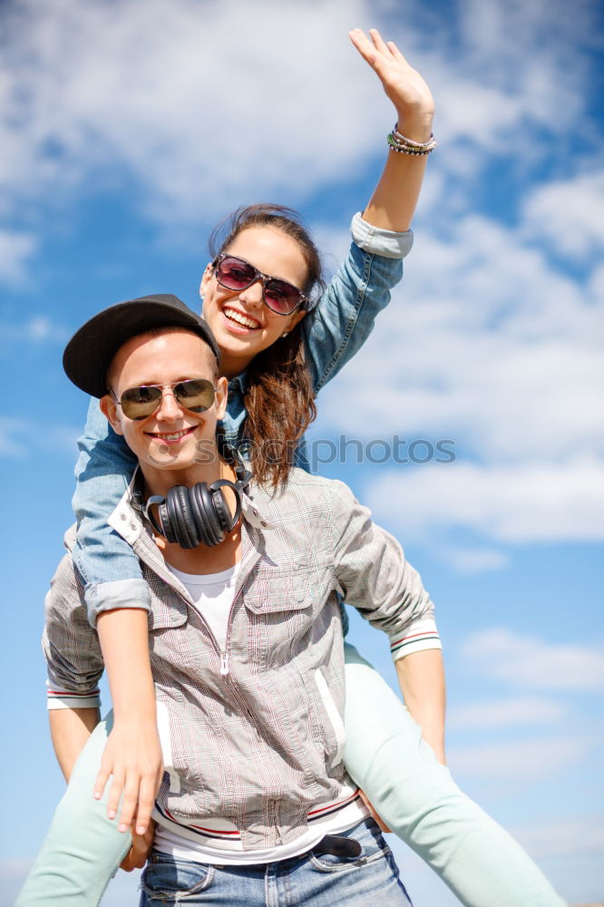 Similar – Image, Stock Photo Happy young adult couple with cute puppy