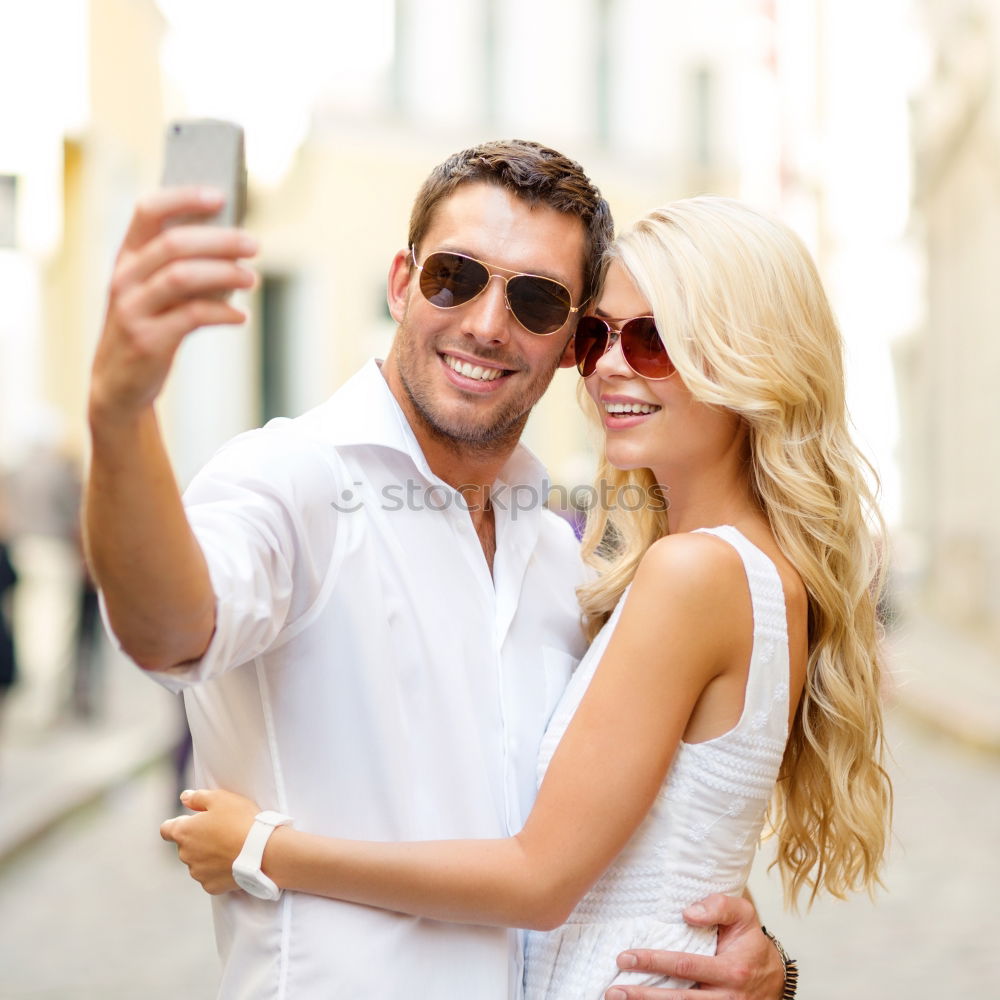 Similar – young couple taking a selfie