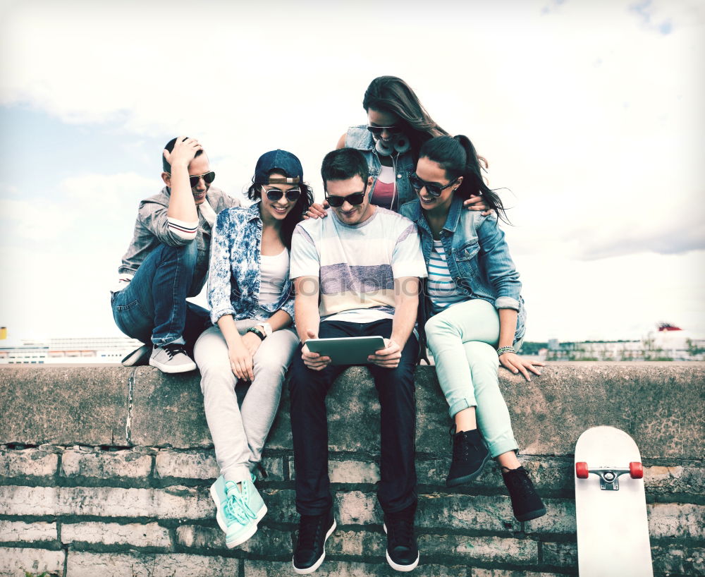 Similar – Image, Stock Photo Group of friends in the street with smartphone