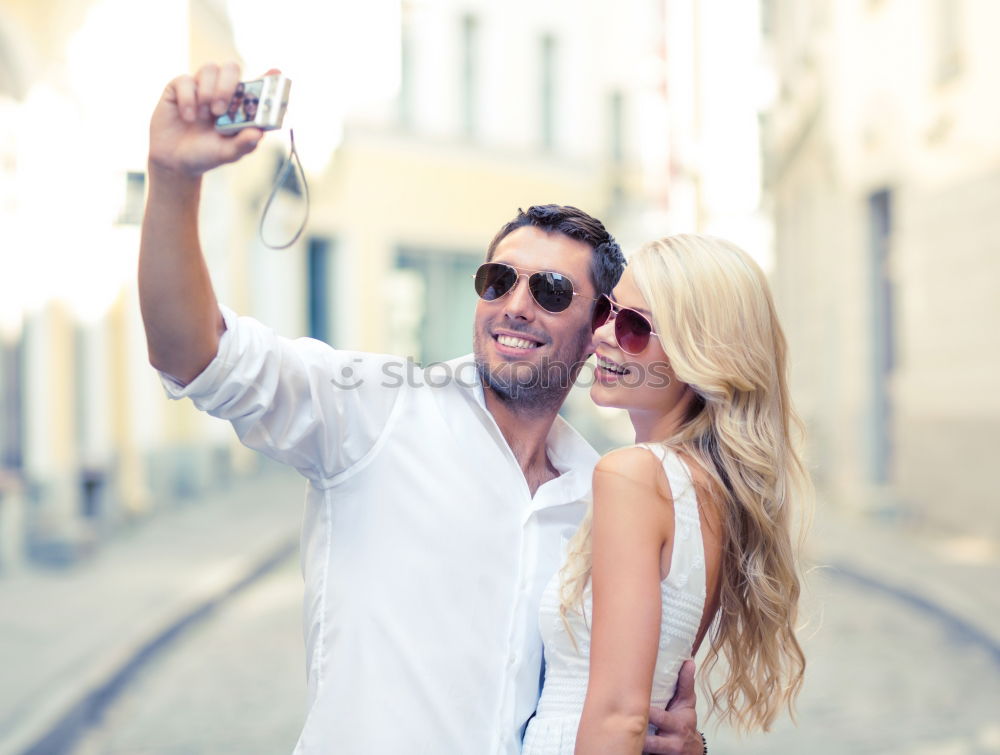 Similar – young couple taking a selfie