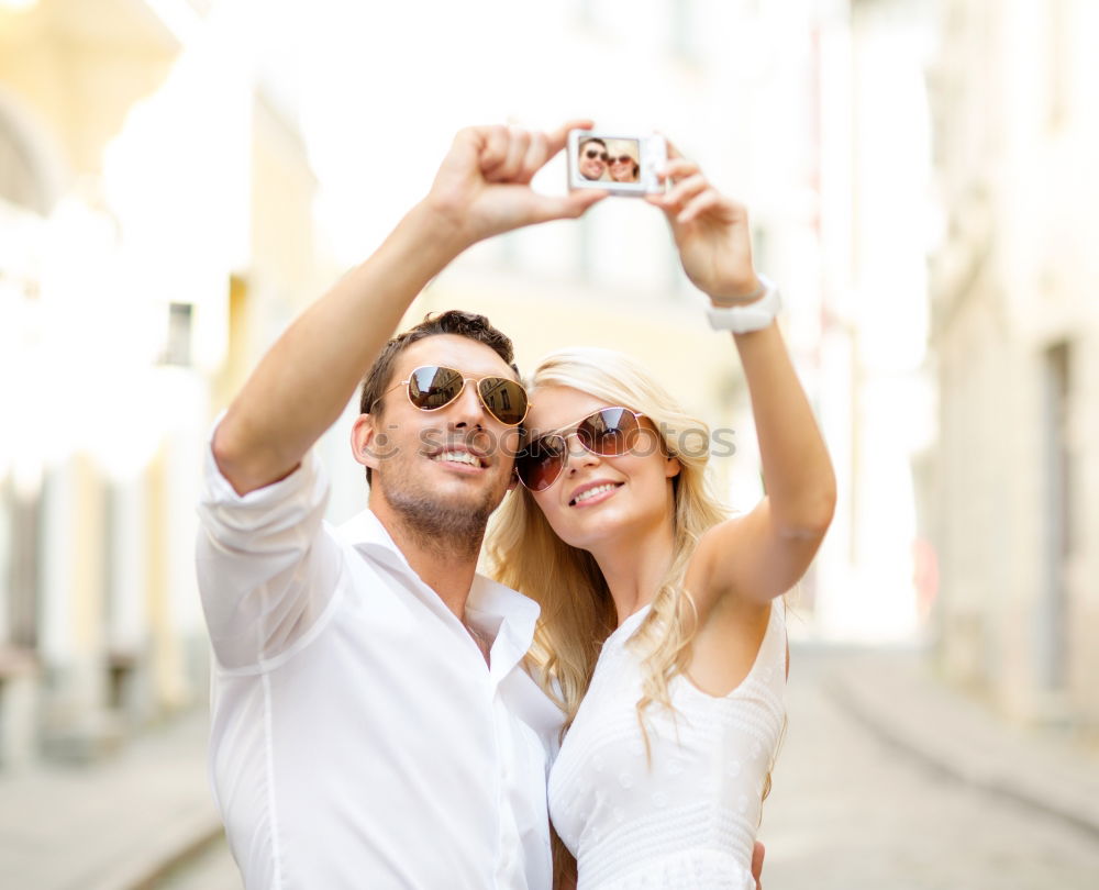 Similar – young couple taking a selfie