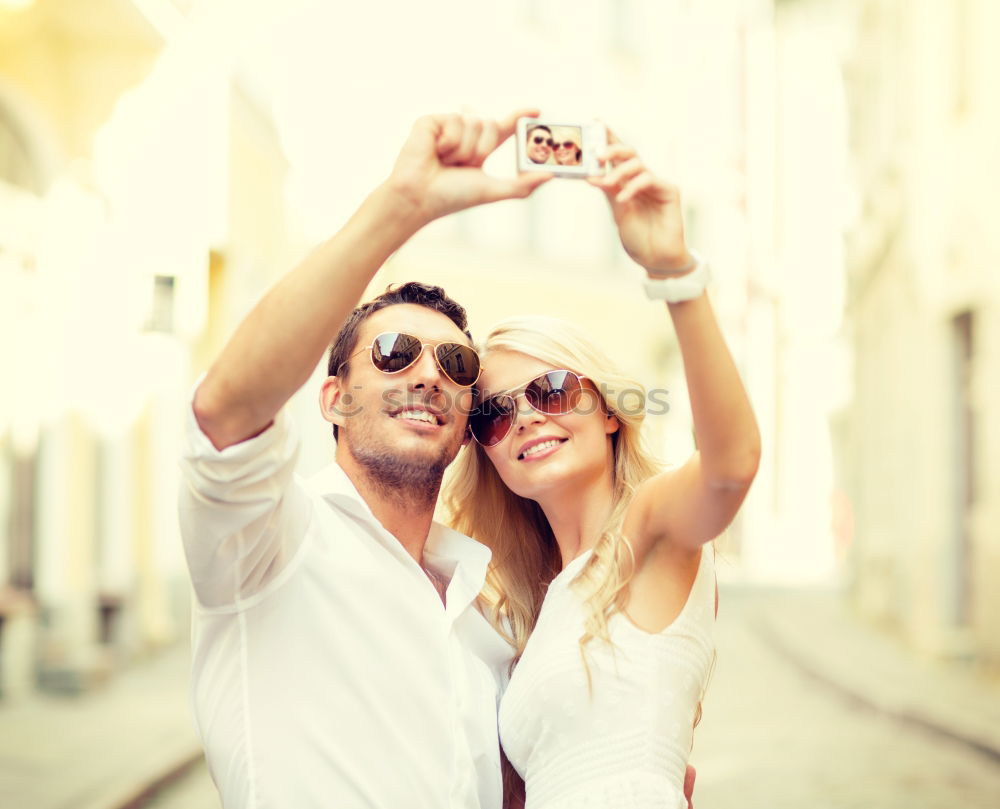 Similar – young couple taking a selfie