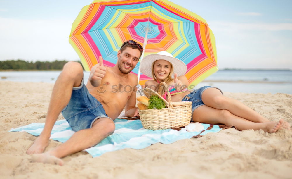 Similar – Father and daughter with balloons playing on the beach