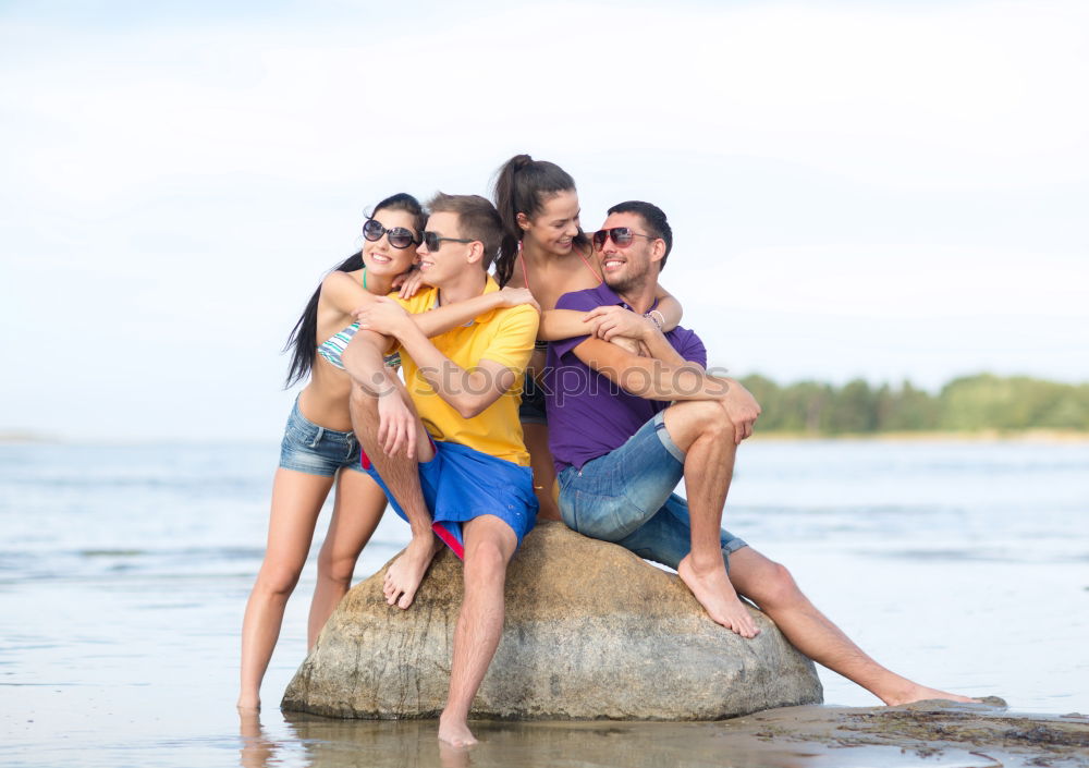 Similar – Happy best friends having good time on the beach together