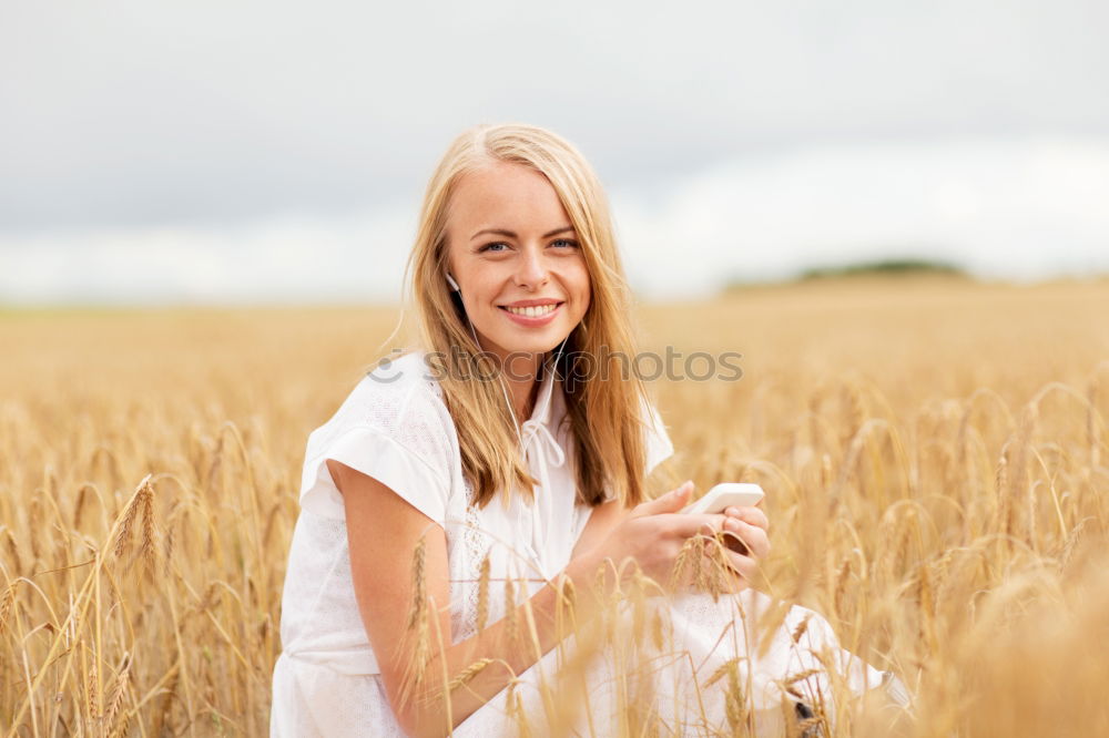 Similar – Image, Stock Photo Young cowgirl in a field of cereals