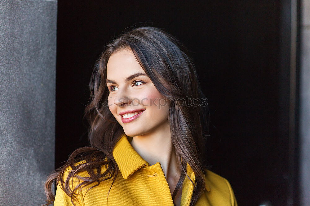 Similar – Young woman wearing casual clothes smiling in urban background