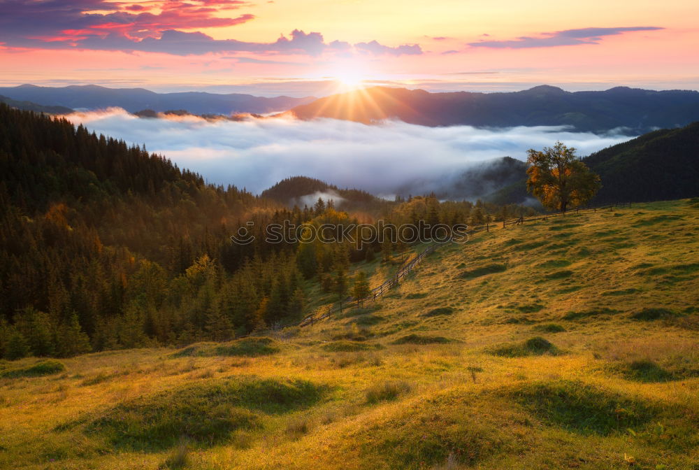 Similar – Panorama of sunset in the mountains