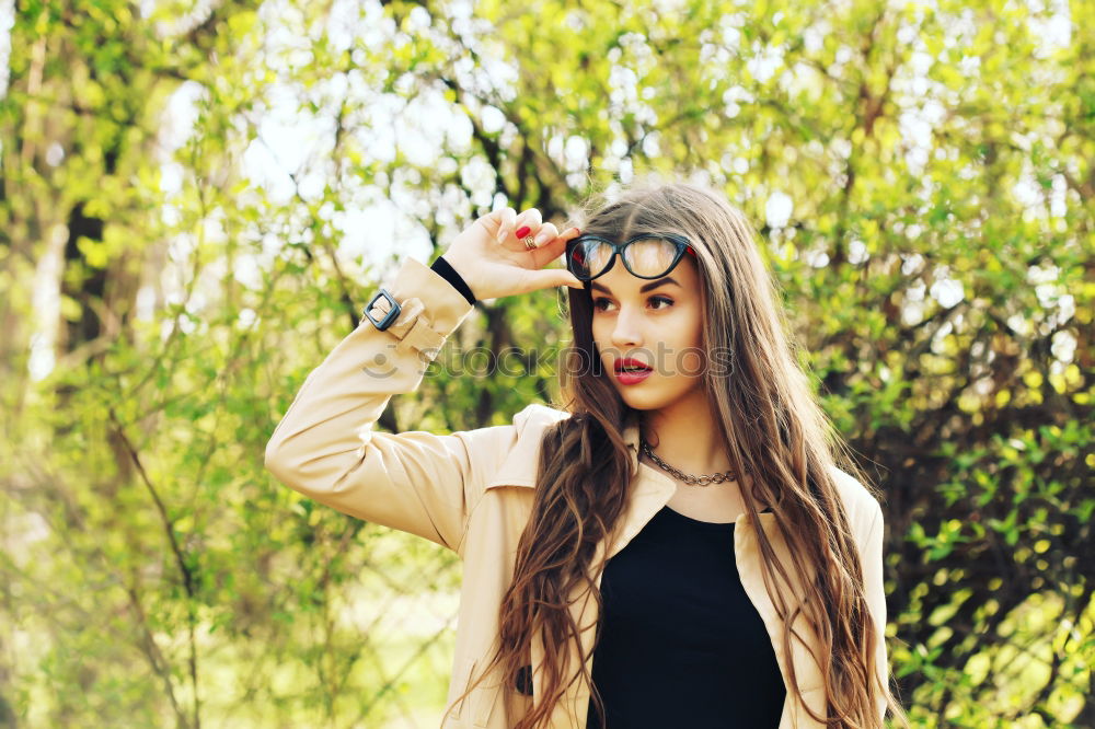 Similar – Stylish girl posing with gadgets