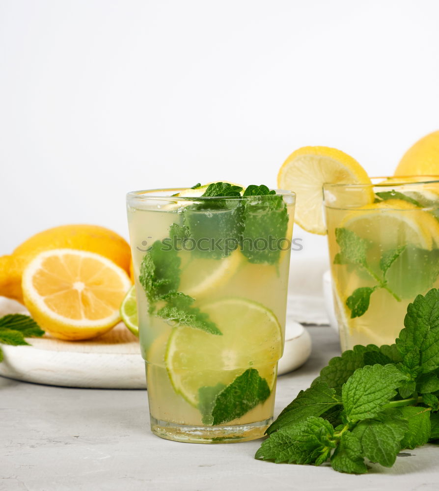 Similar – Elder lemonade with lemon on old table wood