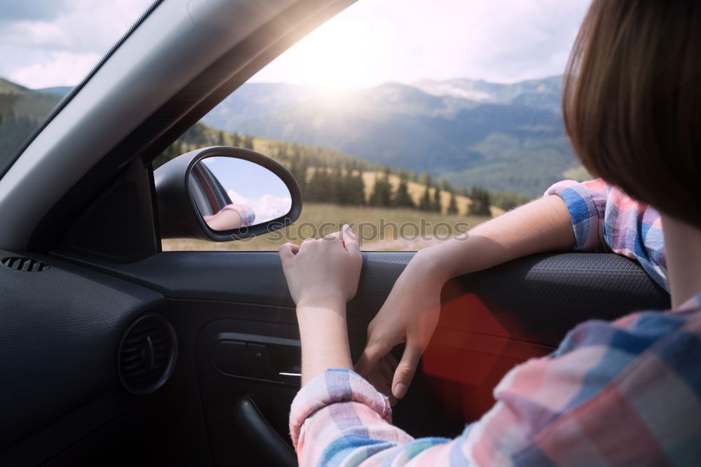Similar – Image, Stock Photo Young woman in the frontseat of a car