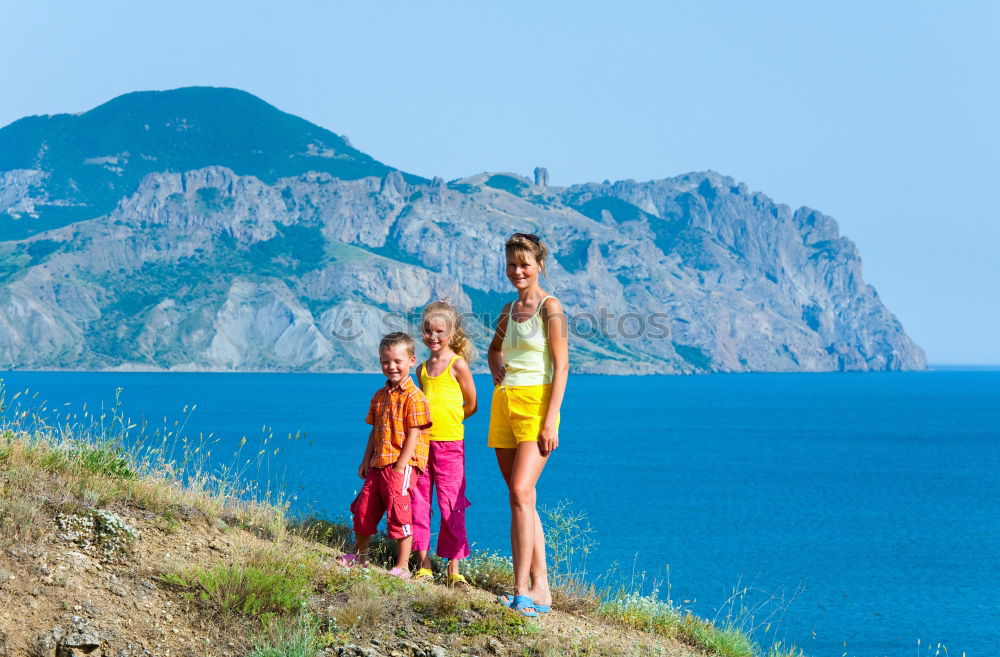 Similar – Image, Stock Photo Happy family standing near the lake at the day time.