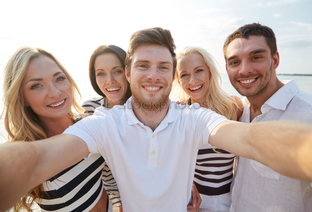 Similar – Image, Stock Photo Group of friends taking selfie in urban background.