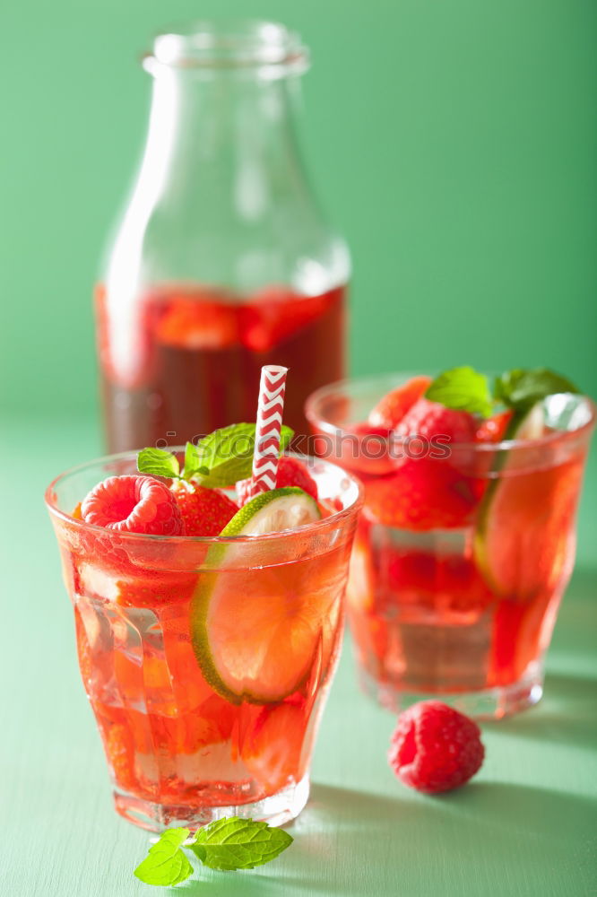 Similar – Image, Stock Photo Summer refreshment with orange and strawberries