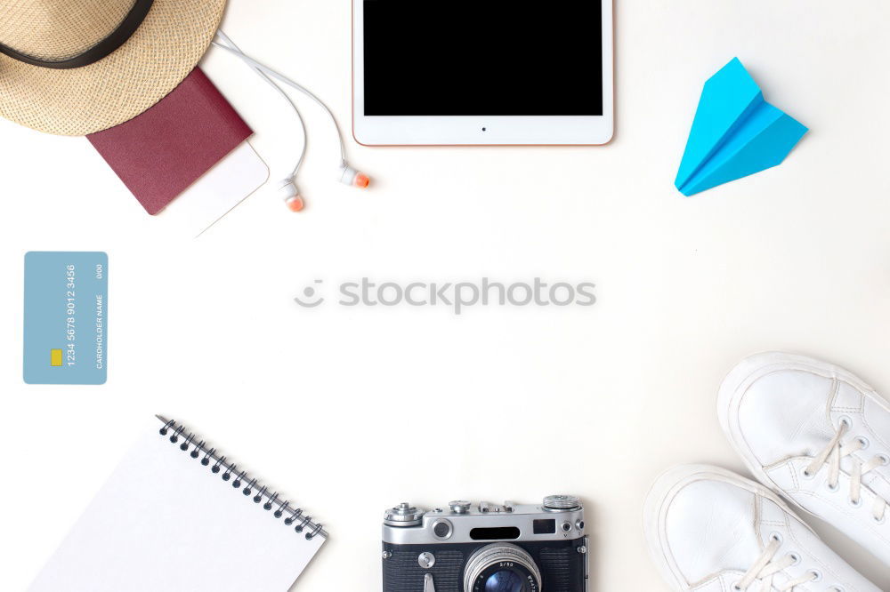 Similar – Flat lay of travel items and accessories