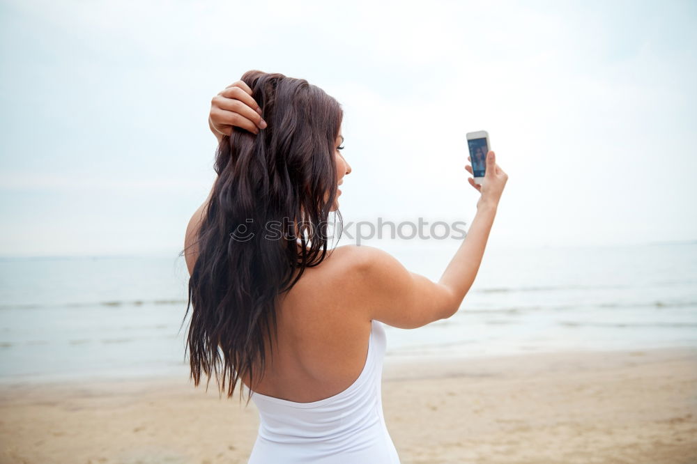 Similar – Image, Stock Photo Lady with camera on shore near stones and water