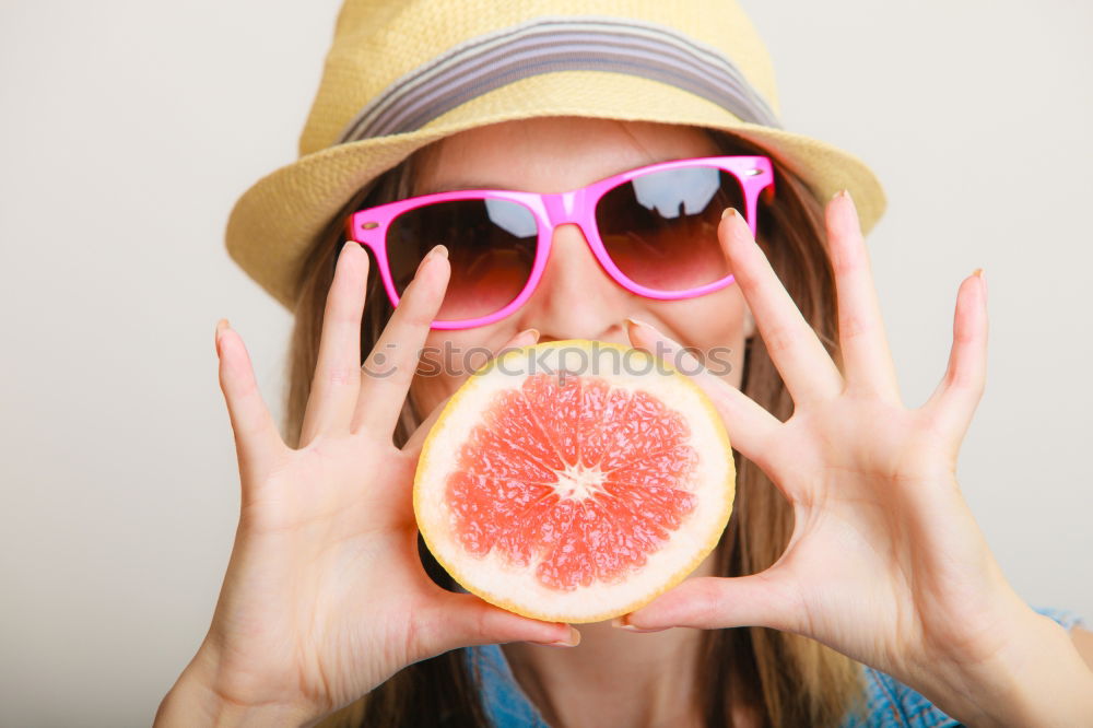 Similar – Not so young but happy Caucasian woman chewing watermelon