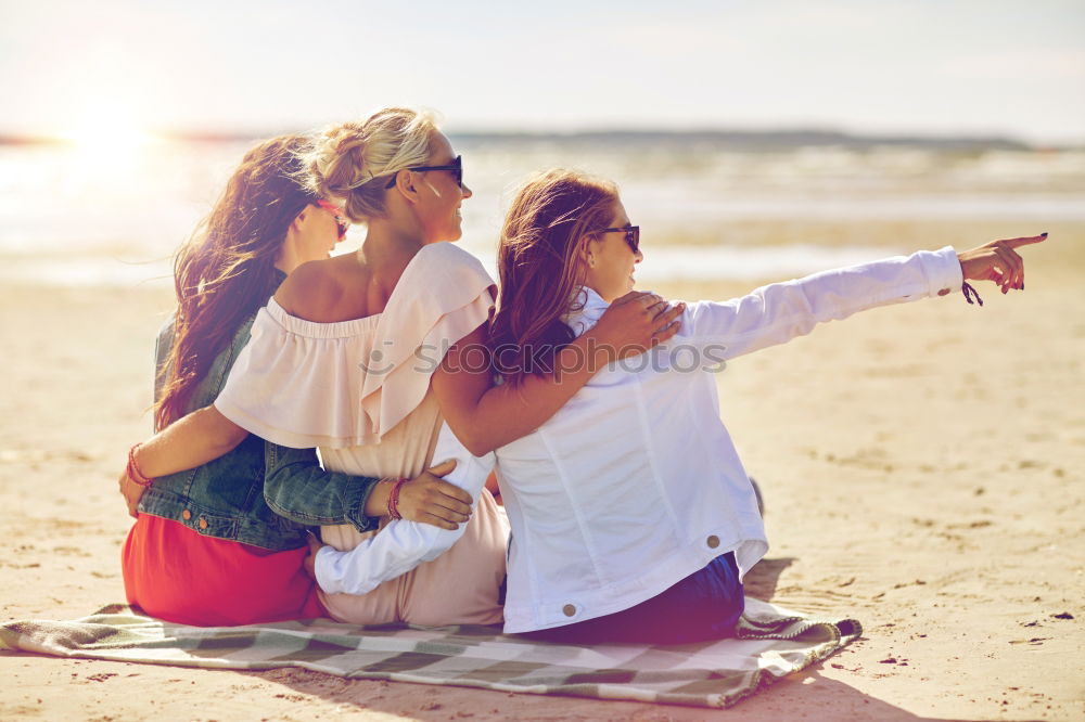 Similar – Group of best friends cheerful on the beach in sunset